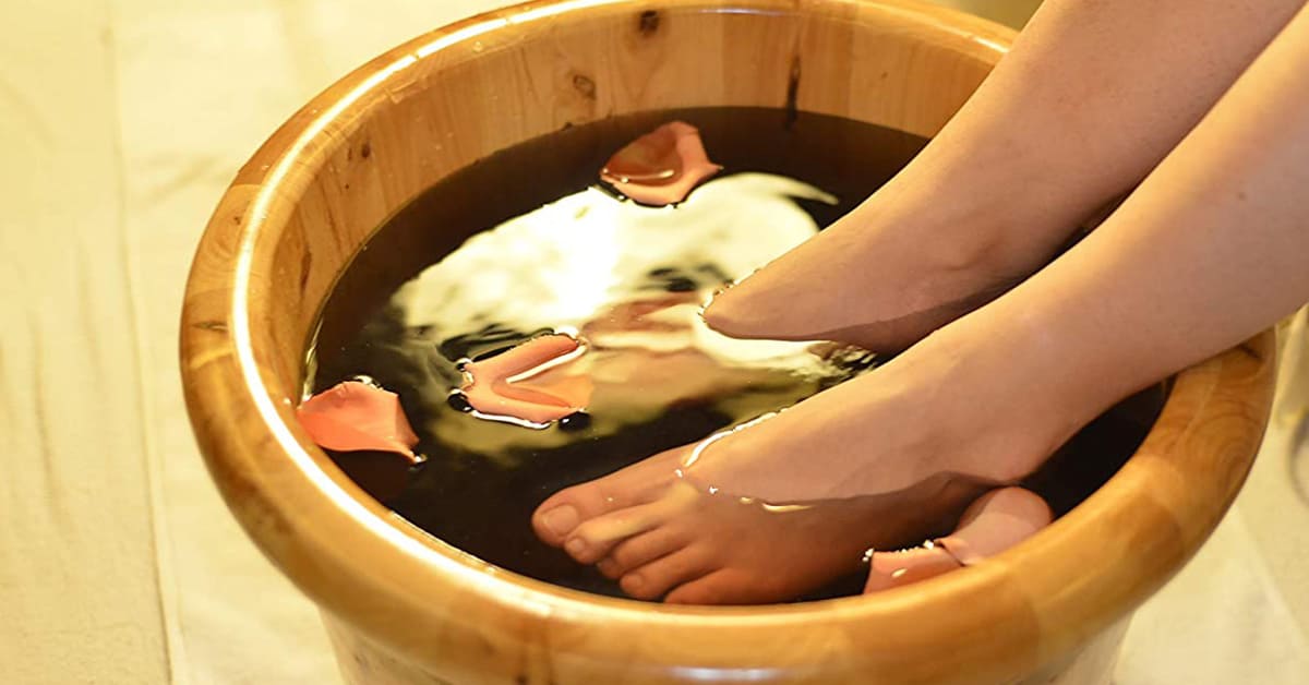 Feet in baking soda bath